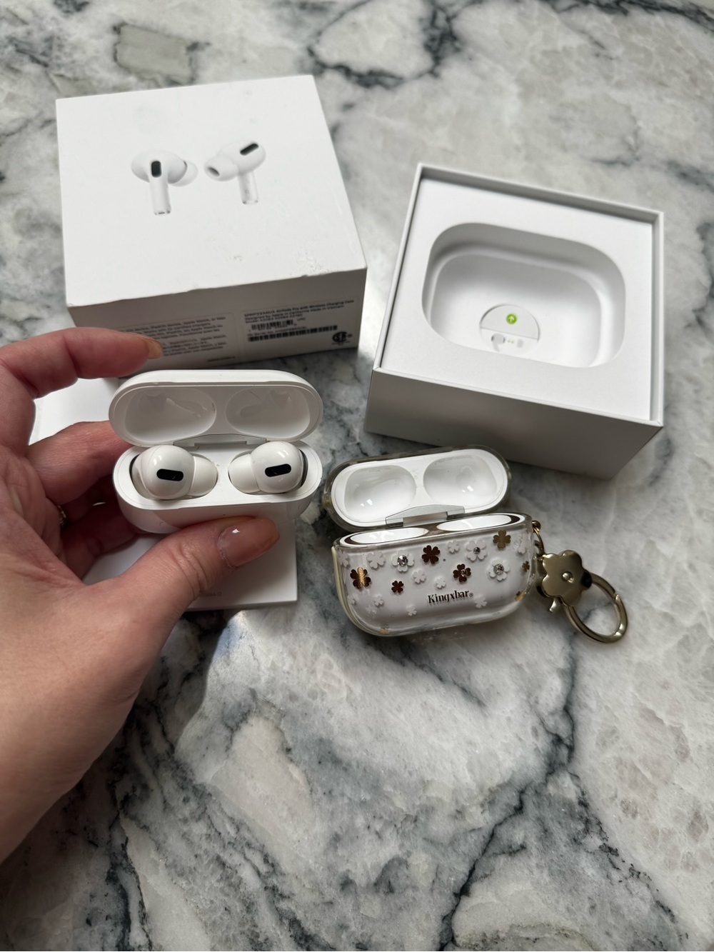 Apple AirPods Pro (White) with bonus extra charging case